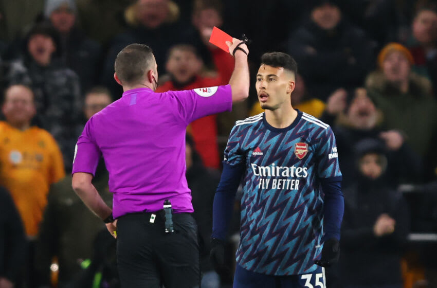 WOLVERHAMPTON, ENGLAND - FEBRUARY 10: Gabriel Martinelli of Arsenal is shown a red card during the Premier League match between Wolverhampton Wanderers and Arsenal at Molineux on February 10, 2022 in Wolverhampton, United Kingdom. (Photo by Marc Atkins/Getty Images)