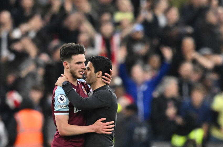 Arsenal's Spanish manager Mikel Arteta (R) congratulates West Ham United's English midfielder Declan Rice (L) at the end of the English Premier League football match between West Ham United and Arsenal at the London Stadium, in London on May 1, 2022. - - RESTRICTED TO EDITORIAL USE. No use with unauthorized audio, video, data, fixture lists, club/league logos or 'live' services. Online in-match use limited to 120 images. An additional 40 images may be used in extra time. No video emulation. Social media in-match use limited to 120 images. An additional 40 images may be used in extra time. No use in betting publications, games or single club/league/player publications. (Photo by Ben Stansall / AFP) / RESTRICTED TO EDITORIAL USE. No use with unauthorized audio, video, data, fixture lists, club/league logos or 'live' services. Online in-match use limited to 120 images. An additional 40 images may be used in extra time. No video emulation. Social media in-match use limited to 120 images. An additional 40 images may be used in extra time. No use in betting publications, games or single club/league/player publications. / RESTRICTED TO EDITORIAL USE. No use with unauthorized audio, video, data, fixture lists, club/league logos or 'live' services. Online in-match use limited to 120 images. An additional 40 images may be used in extra time. No video emulation. Social media in-match use limited to 120 images. An additional 40 images may be used in extra time. No use in betting publications, games or single club/league/player publications. (Photo by BEN STANSALL/AFP via Getty Images)