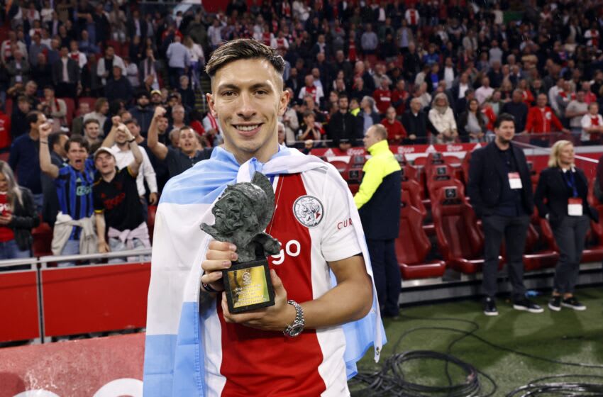 AMSTERDAM - (lr) Lisandro Martinez of Ajax with the Rinus Michels award (player of the year) after winning the 36th Dutch Eredivisie title after the Eredivisie match between Ajax and sc Heerenveen in the Johan Cruijff ArenA on 11 May 2022 in Amsterdam, The Netherlands. ANP MAURICE VAN STEEN (Photo by ANP via Getty Images)
