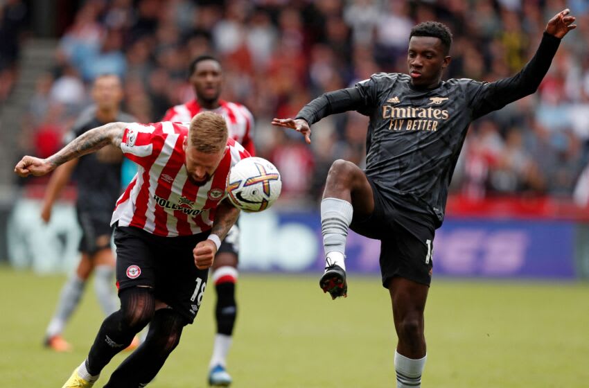 Brentford's Swedish defender Pontus Jansson (L) vies with Arsenal's English striker Eddie Nketiah during the English Premier League football match between Brentford and Arsenal at the Gtech Community Stadium in London on September 18, 2022. - - RESTRICTED TO EDITORIAL USE. No use with unauthorized audio, video, data, fixture lists, club/league logos or 'live' services. Online in-match use limited to 120 images. An additional 40 images may be used in extra time. No video emulation. Social media in-match use limited to 120 images. An additional 40 images may be used in extra time. No use in betting publications, games or single club/league/player publications. (Photo by Ian Kington / AFP) / RESTRICTED TO EDITORIAL USE. No use with unauthorized audio, video, data, fixture lists, club/league logos or 'live' services. Online in-match use limited to 120 images. An additional 40 images may be used in extra time. No video emulation. Social media in-match use limited to 120 images. An additional 40 images may be used in extra time. No use in betting publications, games or single club/league/player publications. / RESTRICTED TO EDITORIAL USE. No use with unauthorized audio, video, data, fixture lists, club/league logos or 'live' services. Online in-match use limited to 120 images. An additional 40 images may be used in extra time. No video emulation. Social media in-match use limited to 120 images. An additional 40 images may be used in extra time. No use in betting publications, games or single club/league/player publications. (Photo by IAN KINGTON/AFP via Getty Images)