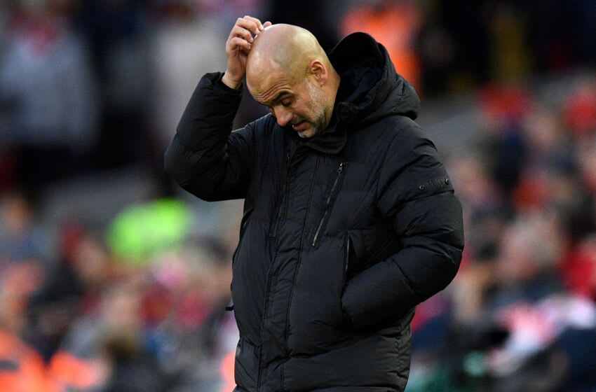 Manchester City's Spanish manager Pep Guardiola gestures on the touchline during the English Premier League football match between Liverpool and Manchester City at Anfield in Liverpool, north west England on October 16, 2022. - - RESTRICTED TO EDITORIAL USE. No use with unauthorized audio, video, data, fixture lists, club/league logos or 'live' services. Online in-match use limited to 120 images. An additional 40 images may be used in extra time. No video emulation. Social media in-match use limited to 120 images. An additional 40 images may be used in extra time. No use in betting publications, games or single club/league/player publications. (Photo by Oli SCARFF / AFP) / RESTRICTED TO EDITORIAL USE. No use with unauthorized audio, video, data, fixture lists, club/league logos or 'live' services. Online in-match use limited to 120 images. An additional 40 images may be used in extra time. No video emulation. Social media in-match use limited to 120 images. An additional 40 images may be used in extra time. No use in betting publications, games or single club/league/player publications. / RESTRICTED TO EDITORIAL USE. No use with unauthorized audio, video, data, fixture lists, club/league logos or 'live' services. Online in-match use limited to 120 images. An additional 40 images may be used in extra time. No video emulation. Social media in-match use limited to 120 images. An additional 40 images may be used in extra time. No use in betting publications, games or single club/league/player publications. (Photo by OLI SCARFF/AFP via Getty Images)