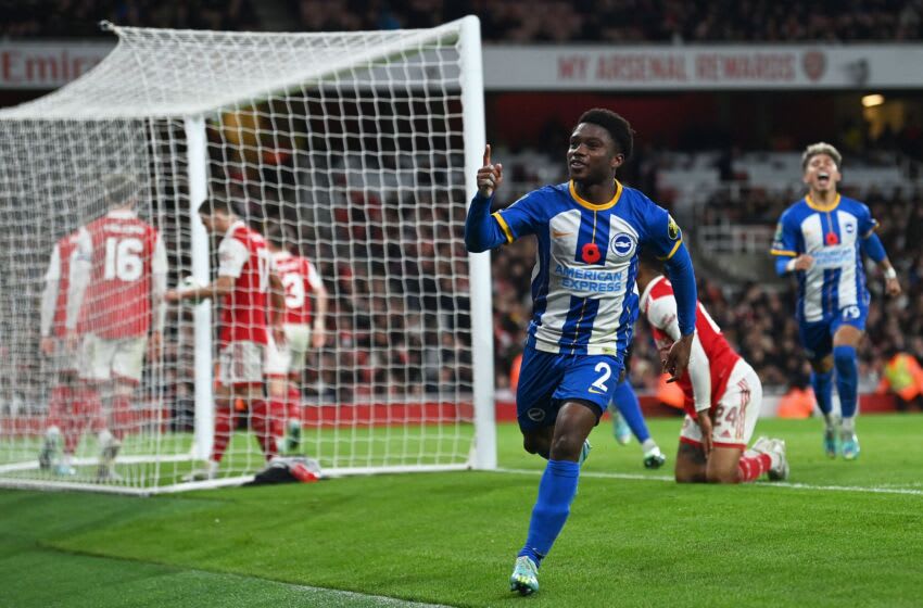 Brighton's English midfielder Tariq Lamptey celebrates scoring his team's third goal during the English League Cup third round football match between Arsenal and Brighton and Hove Albion at the Emirates Stadium, in London on November 9, 2022. - - RESTRICTED TO EDITORIAL USE. No use with unauthorized audio, video, data, fixture lists, club/league logos or 'live' services. Online in-match use limited to 120 images. An additional 40 images may be used in extra time. No video emulation. Social media in-match use limited to 120 images. An additional 40 images may be used in extra time. No use in betting publications, games or single club/league/player publications. (Photo by Glyn KIRK / AFP) / RESTRICTED TO EDITORIAL USE. No use with unauthorized audio, video, data, fixture lists, club/league logos or 'live' services. Online in-match use limited to 120 images. An additional 40 images may be used in extra time. No video emulation. Social media in-match use limited to 120 images. An additional 40 images may be used in extra time. No use in betting publications, games or single club/league/player publications. / RESTRICTED TO EDITORIAL USE. No use with unauthorized audio, video, data, fixture lists, club/league logos or 'live' services. Online in-match use limited to 120 images. An additional 40 images may be used in extra time. No video emulation. Social media in-match use limited to 120 images. An additional 40 images may be used in extra time. No use in betting publications, games or single club/league/player publications. (Photo by GLYN KIRK/AFP via Getty Images)