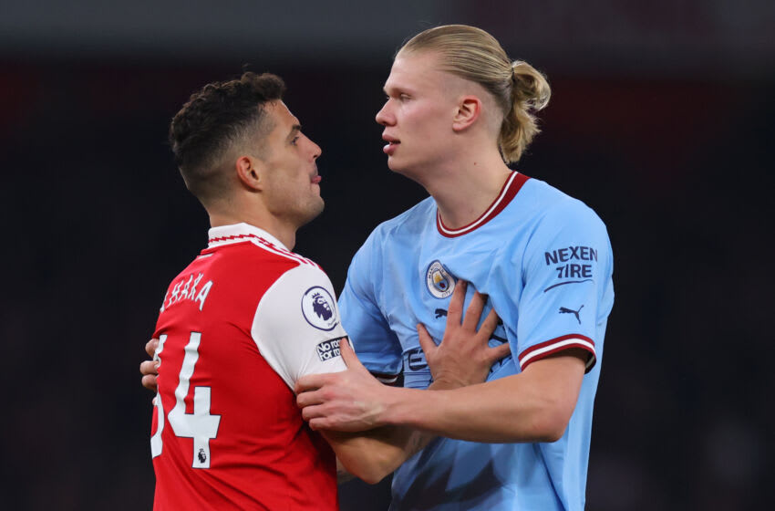 LONDON, ENGLAND - FEBRUARY 15: Granit Xhaka with Erling Haaland of Manchester City during the Premier League match between Arsenal FC and Manchester City at Emirates Stadium on February 15, 2023 in London, United Kingdom. (Photo by Marc Atkins/Getty Images)