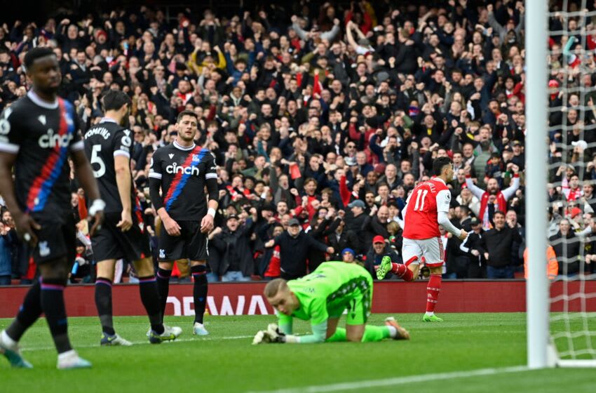 Arsenal's Brazilian midfielder Gabriel Martinelli (R) celebrates after scoring the opening goal of the English Premier League football match between Arsenal and Crystal Palace at the Emirates Stadium in London on March 19, 2023. (Photo by JUSTIN TALLIS / AFP) / RESTRICTED TO EDITORIAL USE. No use with unauthorized audio, video, data, fixture lists, club/league logos or 'live' services. Online in-match use limited to 120 images. An additional 40 images may be used in extra time. No video emulation. Social media in-match use limited to 120 images. An additional 40 images may be used in extra time. No use in betting publications, games or single club/league/player publications. / (Photo by JUSTIN TALLIS/AFP via Getty Images)