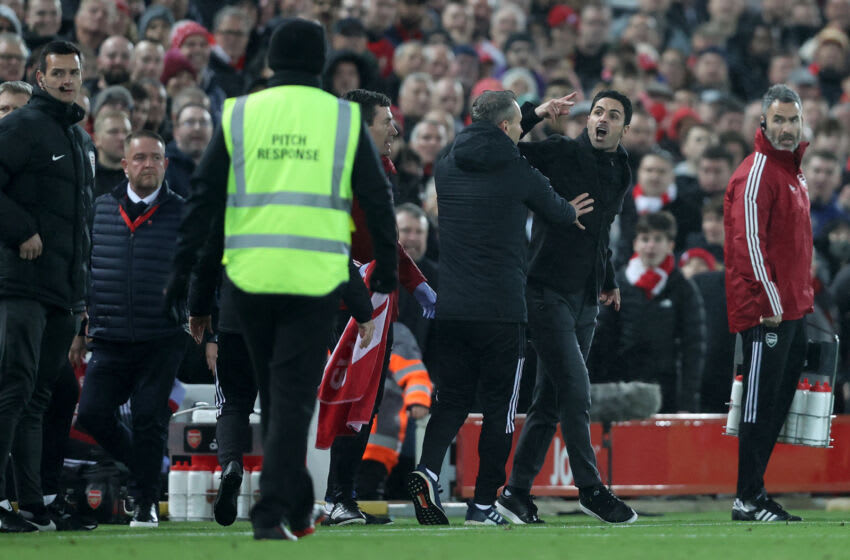 LIVERPOOL, ENGLAND - NOVEMBER 20: Mikel Arteta, Manager of Arsenal gestures to Juergen Klopp, Manager of Liverpool during the Premier League match between Liverpool and Arsenal at Anfield on November 20, 2021 in Liverpool, England. (Photo by Clive Brunskill/Getty Images)