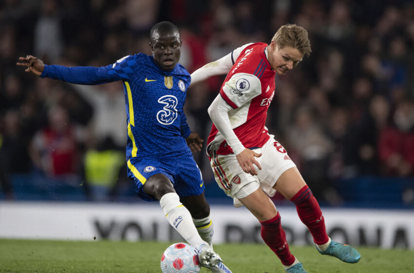 LONDON, ENGLAND - APRIL 20: N'Golo Kante of Chelsea and Martin Martin Odegaard of Arsenal during the Premier League match between Chelsea and Arsenal at Stamford Bridge on April 20, 2022 in London, England. (Photo by Visionhaus/Getty Images)