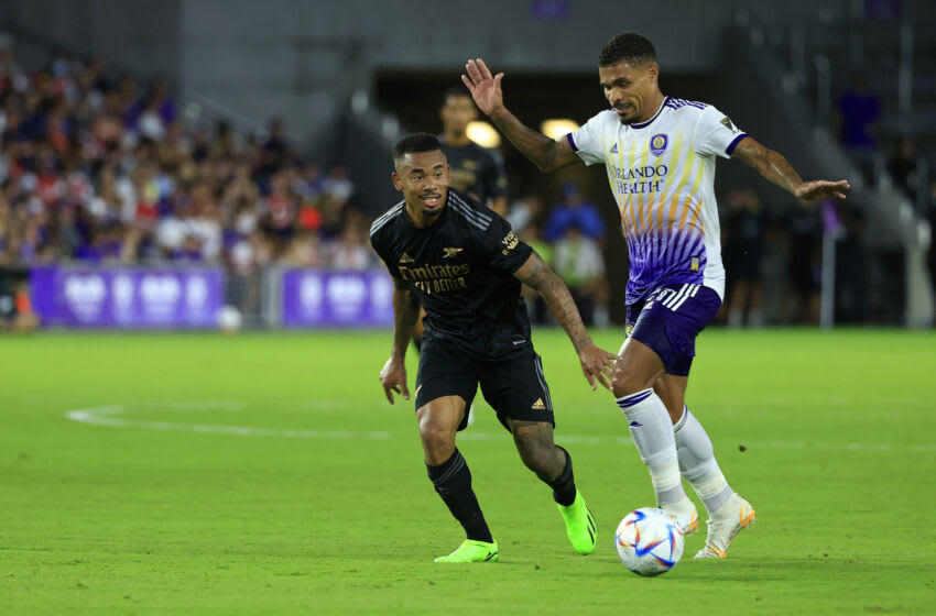 ORLANDO, FLORIDA - JULY 20: Gabriel Jesus #9 of Arsenal and Facundo Torres #17 of Orlando City fight for the ballduring a Florida Cup friendly at Exploria Stadium on July 20, 2022 in Orlando, Florida. (Photo by Mike Ehrmann/Getty Images)
