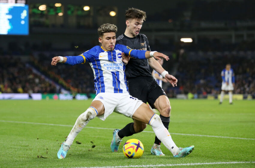 BRIGHTON, ENGLAND - DECEMBER 31: Jeremy Sarmiento of Brighton & Hove Albion battles for possession with Kieran Tierney of Arsenal during the Premier League match between Brighton & Hove Albion and Arsenal FC at American Express Community Stadium on December 31, 2022 in Brighton, England. (Photo by Steve Bardens/Getty Images)