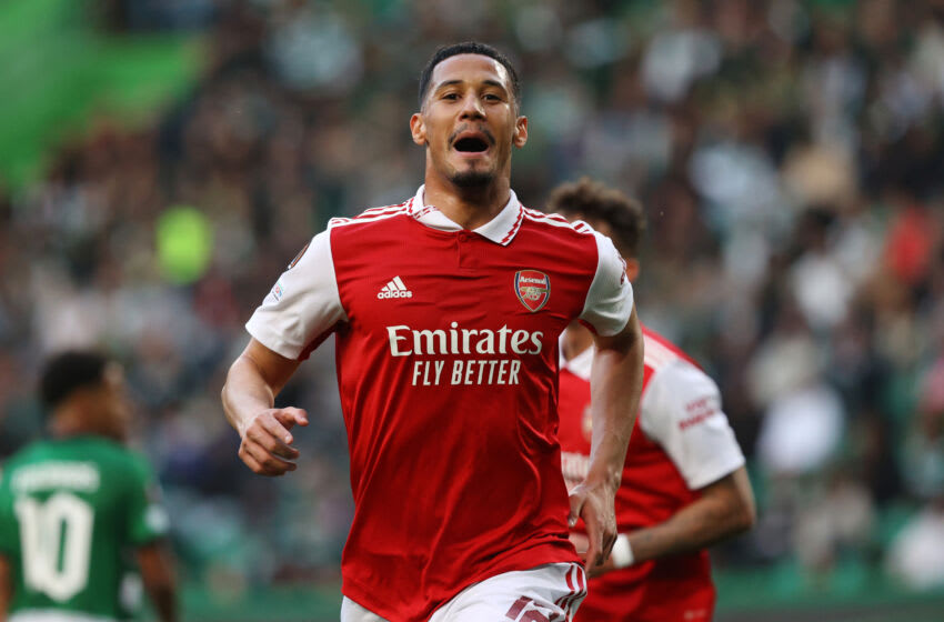 LISBON, PORTUGAL - MARCH 09: William Saliba of Arsenal celebrates after scoring the team's first goal during the UEFA Europa League round of 16 leg one match between Sporting CP and Arsenal FC at Estadio Jose Alvalade on March 09, 2023 in Lisbon, Portugal. (Photo by Carlos Rodrigues/Getty Images)