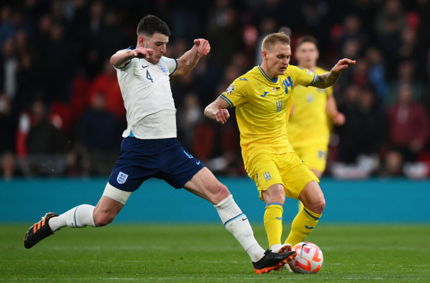 LONDON, ENGLAND - MARCH 26: Declan Rice of England battles for possession with Vitaliy Buyalskyi of Ukraine during the UEFA EURO 2024 qualifying round group C match between England and Ukraine at Wembley Stadium on March 26, 2023 in London, England. (Photo by Mike Hewitt/Getty Images)