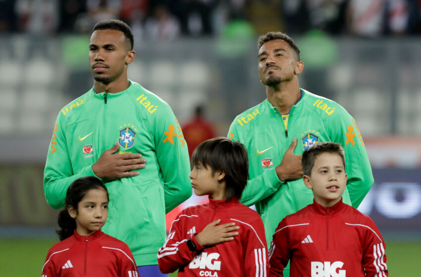 LIMA, PERU - SEPTEMBER 12: Gabriel Magalhães (L) and Danilo of Brazil line up prior to a FIFA World Cup 2026 Qualifier match between Peru and Brazil at Estadio Nacional de Lima on September 12, 2023 in Lima, Peru. (Photo by Mariana Bazo/Getty Images)