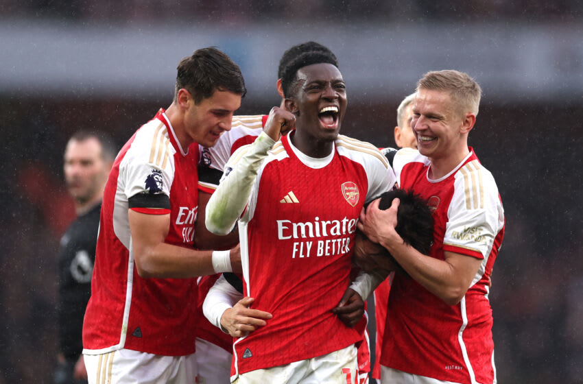 LONDON, ENGLAND - OCTOBER 28: Takehiro Tomiyasu of Arsenal celebrates with teammates after scoring the team's fifth goal during the Premier League match between Arsenal FC and Sheffield United at Emirates Stadium on October 28, 2023 in London, England. (Photo by Alex Pantling/Getty Images)