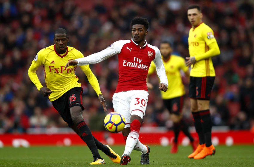 LONDON, ENGLAND - MARCH 11: Ainsley Maitland-Niles of Arsenal holds of Abdoulaye Doucoure of Watford during the Premier League match between Arsenal and Watford at Emirates Stadium on March 11, 2018 in London, England. (Photo by Julian Finney/Getty Images)