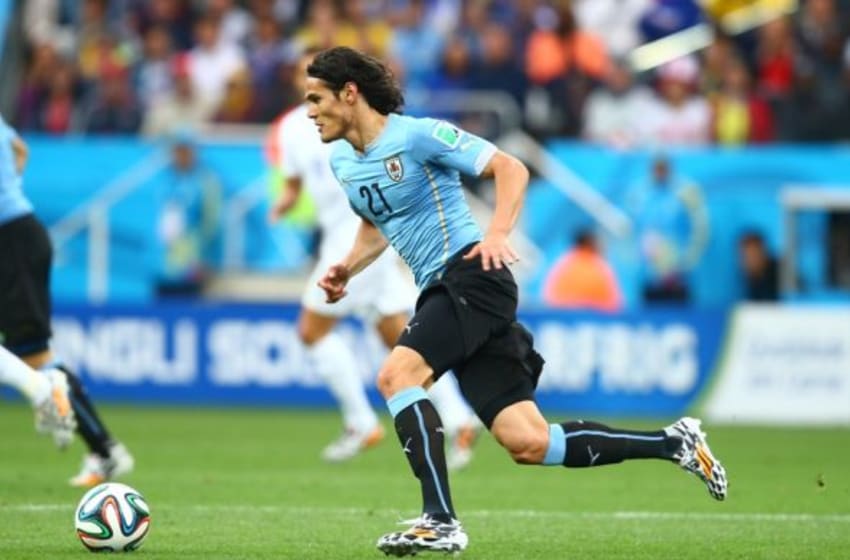 Jun 19, 2014; Sao Paulo, BRAZIL; Uruguay forward Edinson Cavani (21) against England during the 2014 World Cup at Arena Corinthians. Uruguay defeated England 2-1. Mandatory Credit: Mark J. Rebilas-USA TODAY Sports